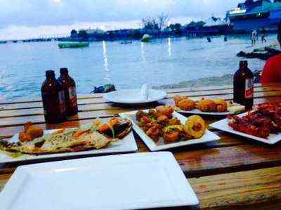 Fresh grilled lobster at Lobster Dave, a beachside seafood spot in Ocho Rios